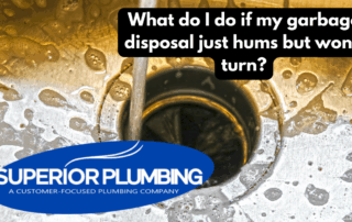 What do I do if my garbage disposal just hums but won’t turn?